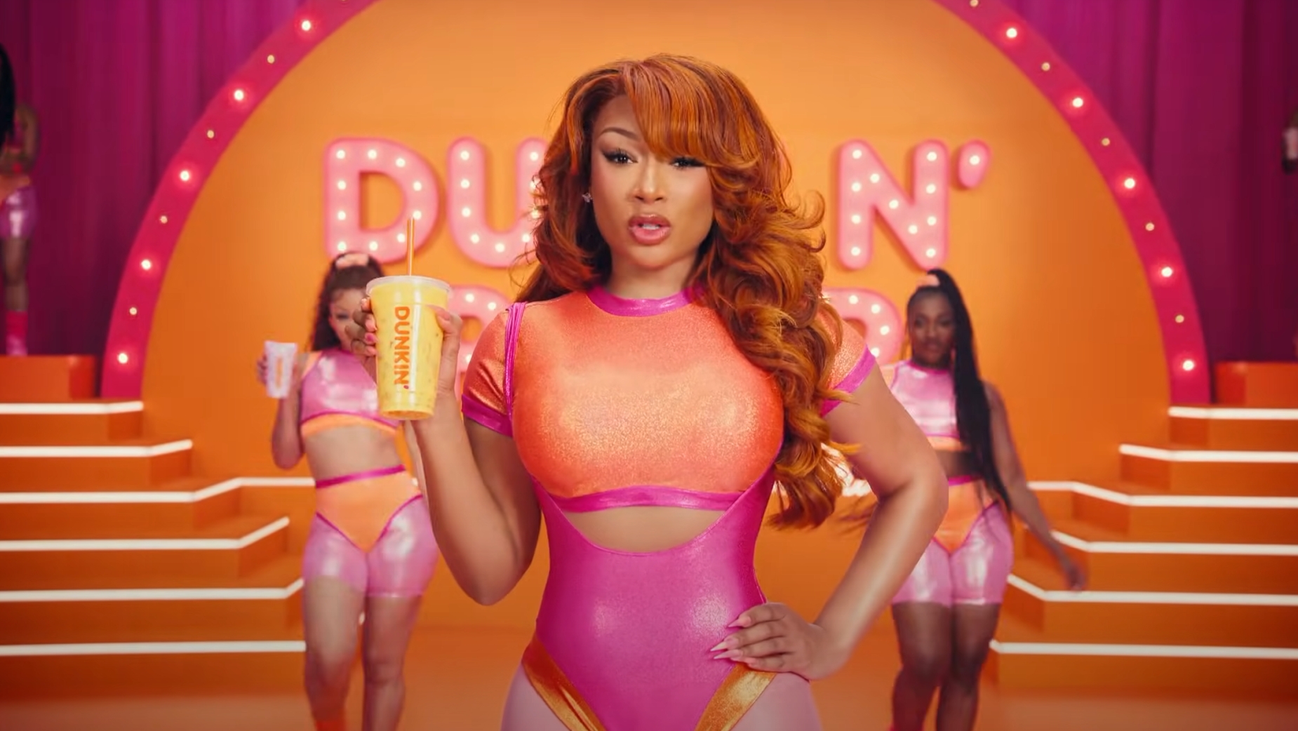 Megan Thee Stallion Dunks N' Pumps in Dunkin' Fitness Video