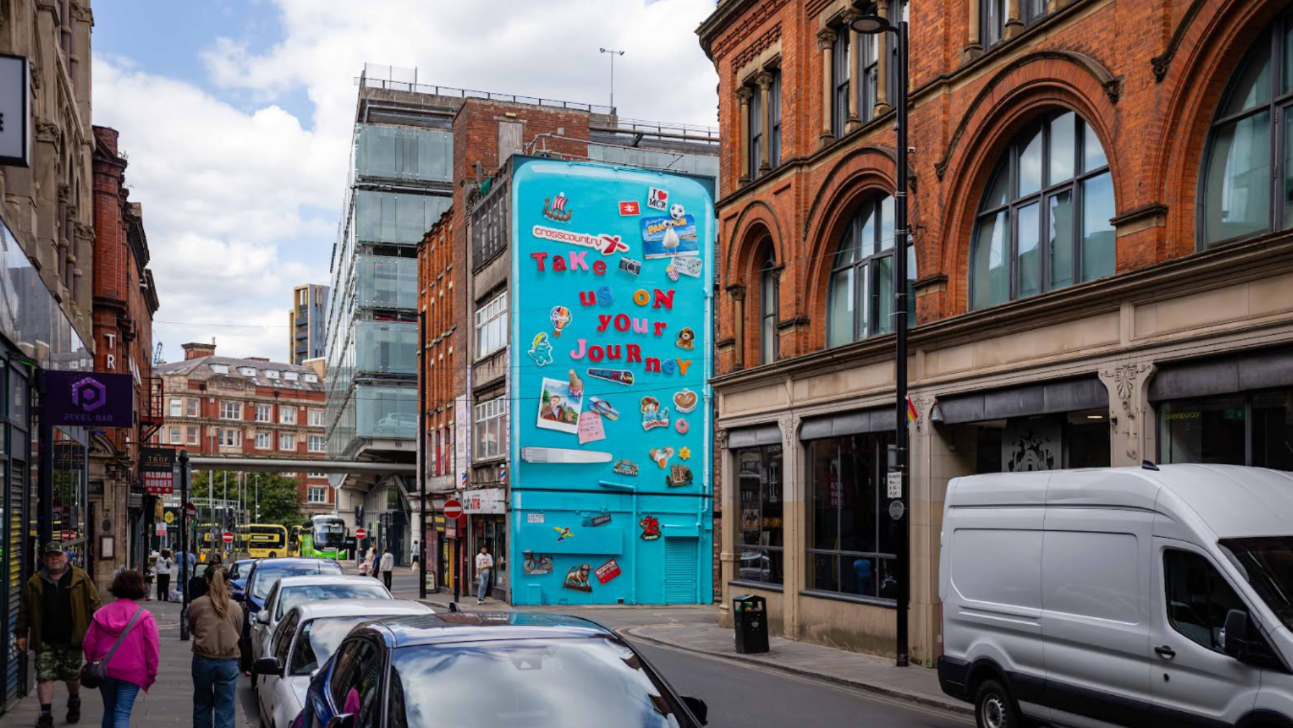 CrossCountry Been There Seen That mural in Manchester featuring a giant fridge door filled with travel memories