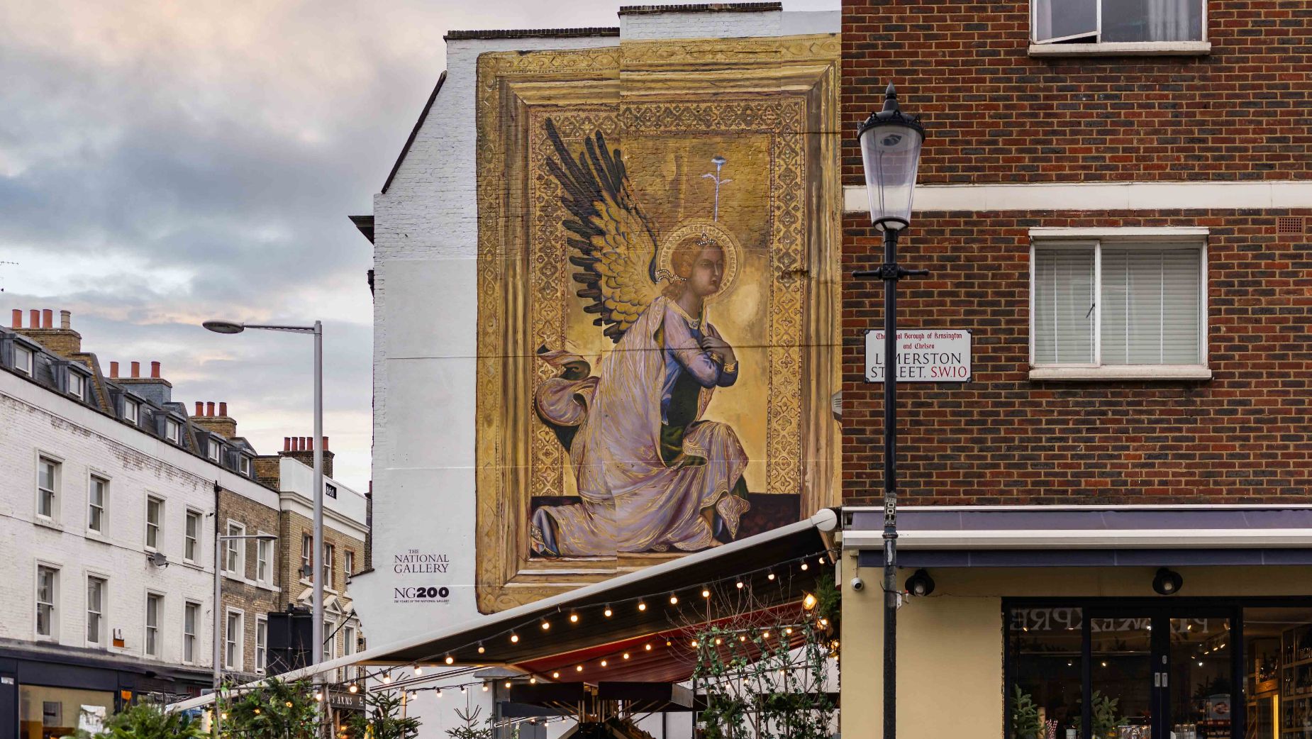 Simone Martini’s Angel Gabriel (about 1326-34) painted by Global Street Art on Fulham Road in 2024